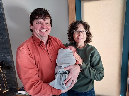 Grandma and Grandpa with our first grandchild